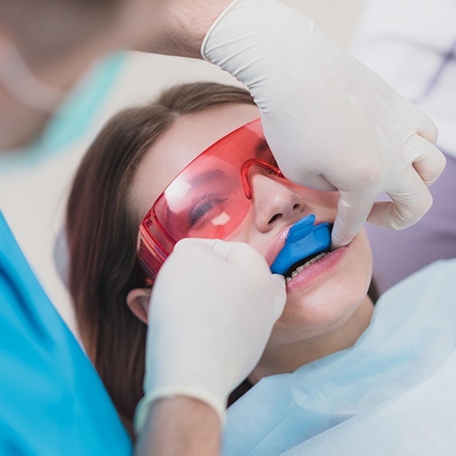 Patient receiving fluoride treatment