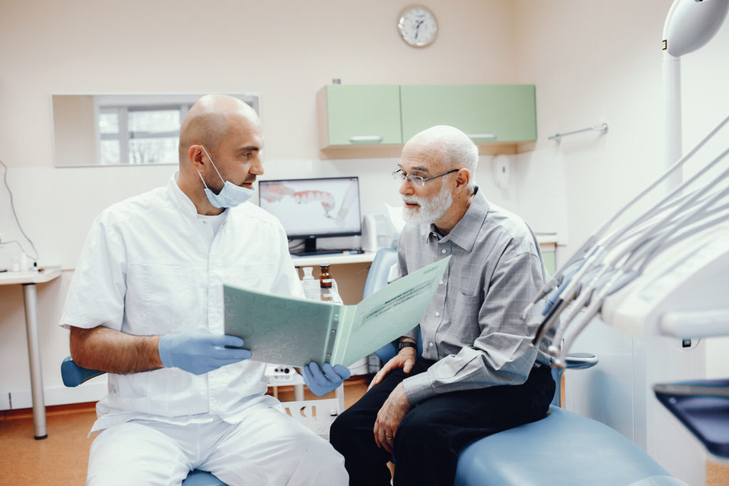 man discussing dental myths in Columbus with dentist