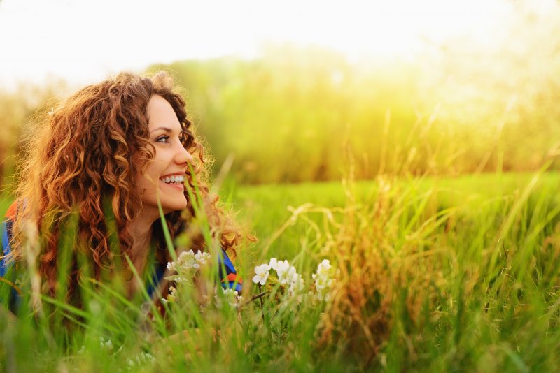 Woman smiling outside